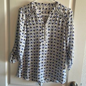 Women’s  small blouse. Half sleeve zipper on front, cut outs near the shoulder.